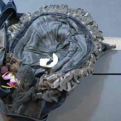 407 - underside of black straw hat