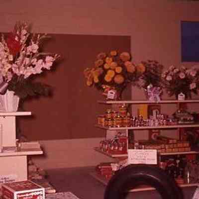 12. Brooks Service Opening Event - Sept. 1959: Sales room interior with decorations