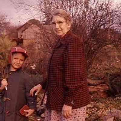 7. KJH and his grandmother, MCC, Monk house backyard, corner of Lindsay house, and chicken house in back: Monk house - Dec. 1958