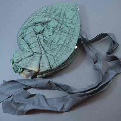 2023.dpw.347 - Quilted bonnet worn by the great-grandmother of A.W. "Tony" Monroe - 1840.