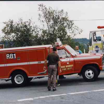 Oak Harbor Fire Dept. vehicles at crash scene.