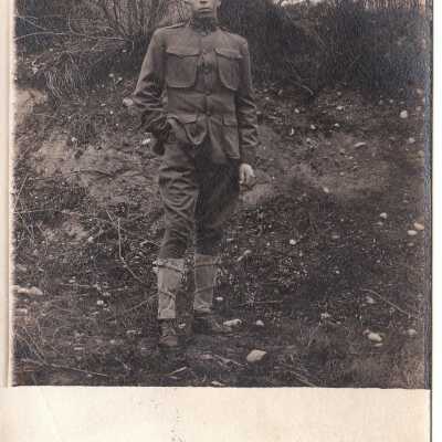 Soldier on rocky hill: Origsize: 3.5x5.5; Origformat: Print-Photographic