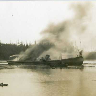 Steamer Whidby burning at dock in Oak Harbor