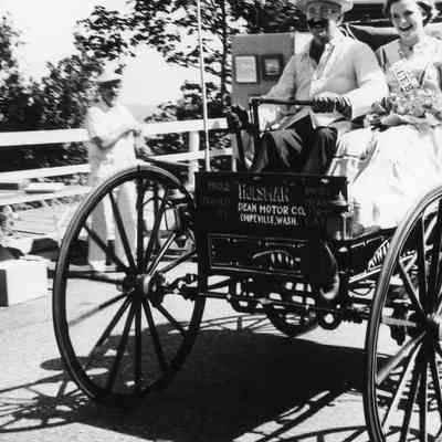 Holsman car on the move in parade.