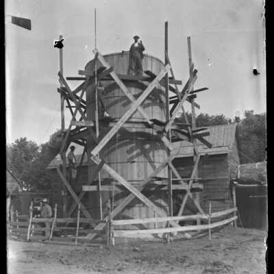 Water tower under construction: Origsize: 4x5; Origformat: Negative