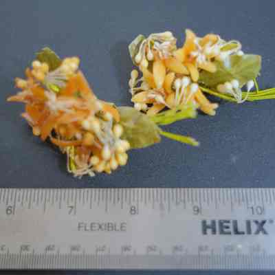 505 - 2 clusters of orange plastic flowers, wedding shoe decor, c. 1917