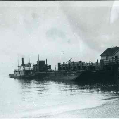 Tug taking Barge into Dock