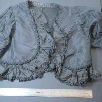 2023.dpw.276 - short bolero jacket w/ ruffle edging, shows damage: DPW CB 16 Shelf D