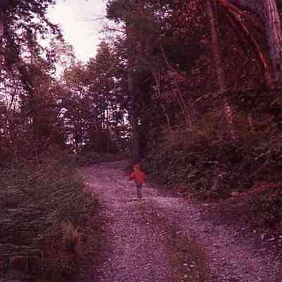 245. KJH on dirt road at Rhododendron Park: May 1957
