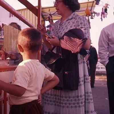 246. KJH & EYH at County Fair, corn dog stand: Langley - Sept. 1957