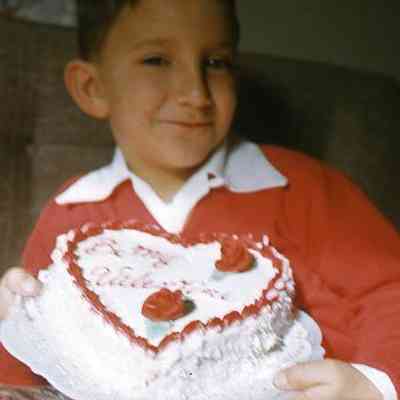 248. KJH with Be My Valentine cake: Zylstra House - Feb. 1960