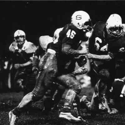 Muddy football game.