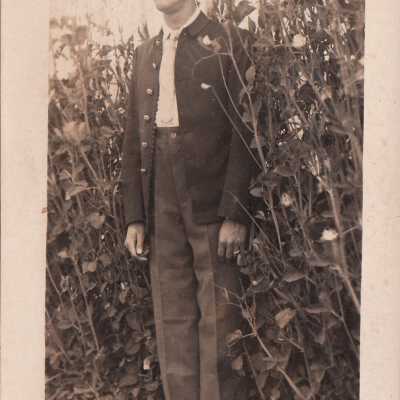 Soldier posing in plants, member of 71st Co: Origsize: 3.5x5.5; Origformat: Print-Photographic