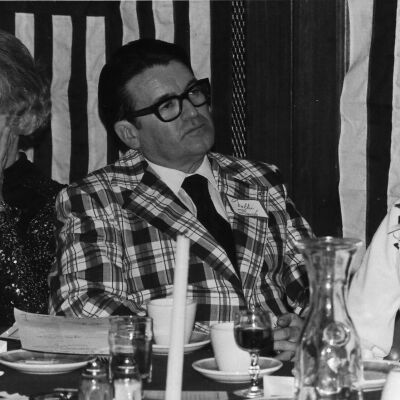 Wally Funk listens to speakers at Navy League dinner.