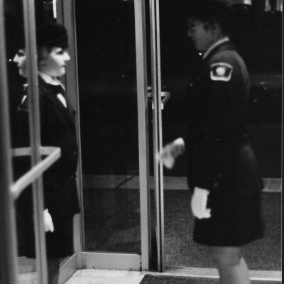 Female cadets at door.