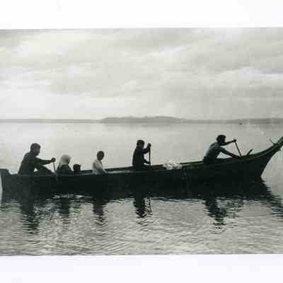 Indigenous Family in Canoe