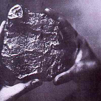 Hands Holding an Artifact