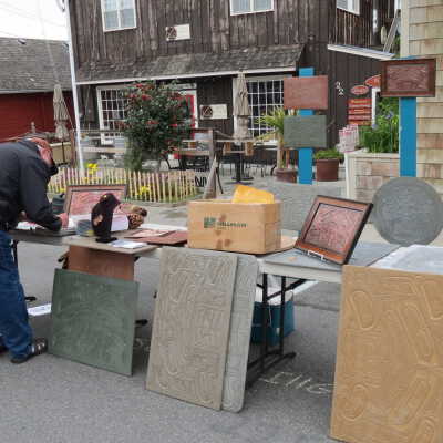 Carving artist's booth on front street