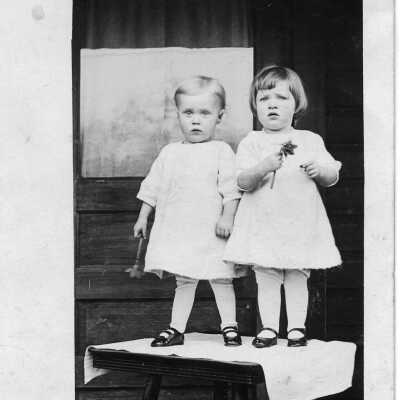 Photograph, Smith twins, Willis George and Phyllis Edith Smith Sanders, twins children of Frank and Isabella T. Smith, 1913 in Oak Harbor. Acc # 2019.018.184