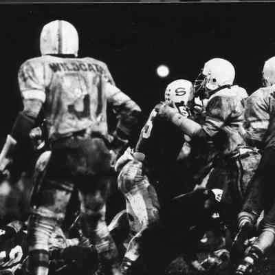 Muddy football game.