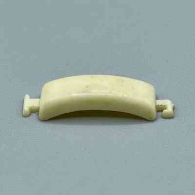 Curved cream plastic hair-tie bar (ponytail holder), elastic band absent