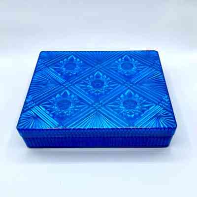 Lidded box of molded blue plastic imitating cut glass