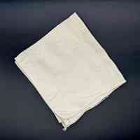 White damask napkin (table linen)