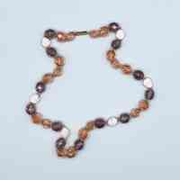 Bead-and-link necklace, faceted peach and amethyst glass with white beads