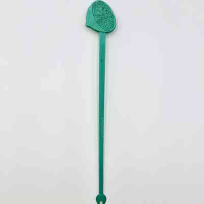 Drink stirrer with halved-citrus (lime) finial ("MADE IN CUBA — PAT. 5008")