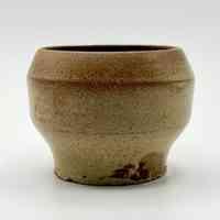 Wheel-thrown stoneware vessel (footed cup/bowl), speckled buff glaze
