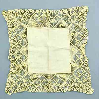 Crochet-bordered square textile (handkerchief or small doily), yellow