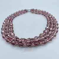 Triple-strand faceted glass bead necklace, amethyst/pink, with rhinestone clasp