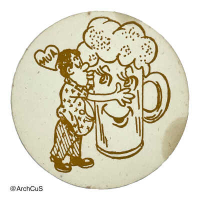 Circular coaster, design of a cartoon man kissing a giant cup of beer.