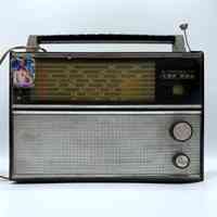 VEF 204 transistor radio, with affixed Sacred Heart of Jesus devotional image