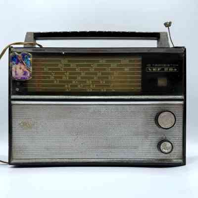 VEF 204 transistor radio, with affixed Sacred Heart of Jesus devotional image