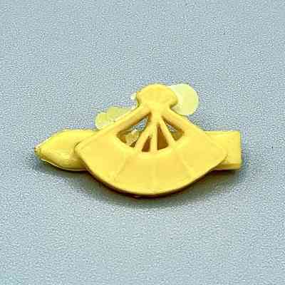 Molded-plastic toddler's hair barrette (fan motif, yellow)
