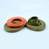Paper streamer (serpentina), green/olive, coiled