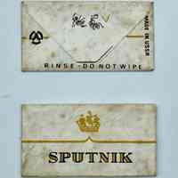 "Sputnik" double-edge safety razor blade with paper wrapper