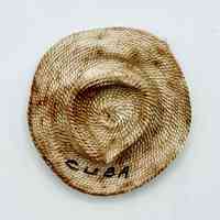 Miniature woven-straw souvenir sombrero brooch, hand-lettered "CUBA"