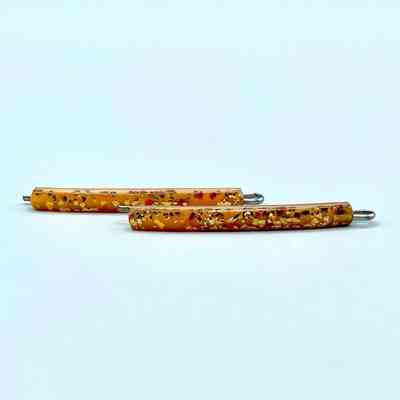 Confetti-lucite "Flower Brand" hair pins (amber/gold, pair), on original card
