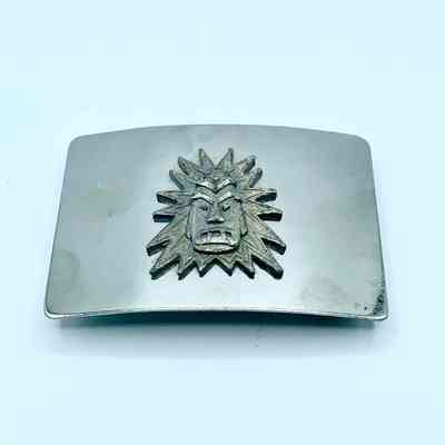 Belt buckle, artisanal, with radiant sun-face (mask) appliqué