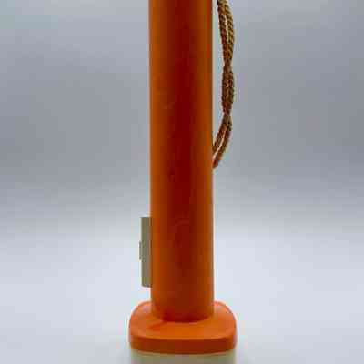 Pocket flashlight (torch) — marbled orange plastic with cream head