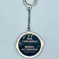 Road-safety perpetual-calendar keychain, "Más conciencia, menos accidentes" (Semana del Tránsito)
