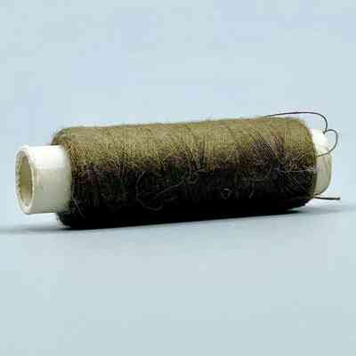 Spool of sewing thread, brown