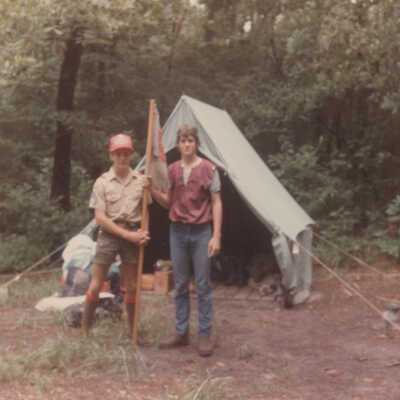 2 Unkown Guys holding flag