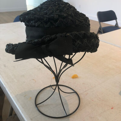 Black Straw Hat with a Ribbon and a Bow