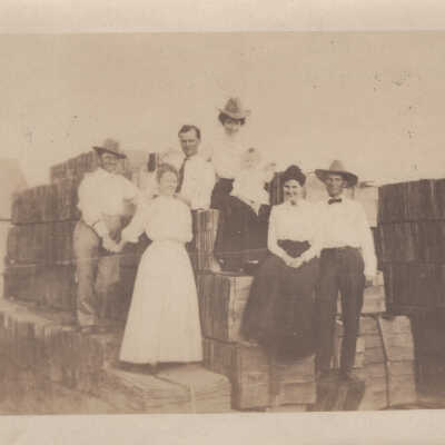 A group standing on lumber