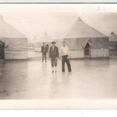 Men standing in water