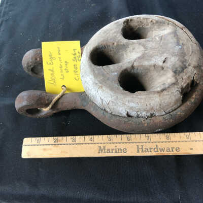 Metal Horseshoe with Wooden Ball that has 3 Holes