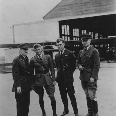 Standing in front of Airplane Hanger